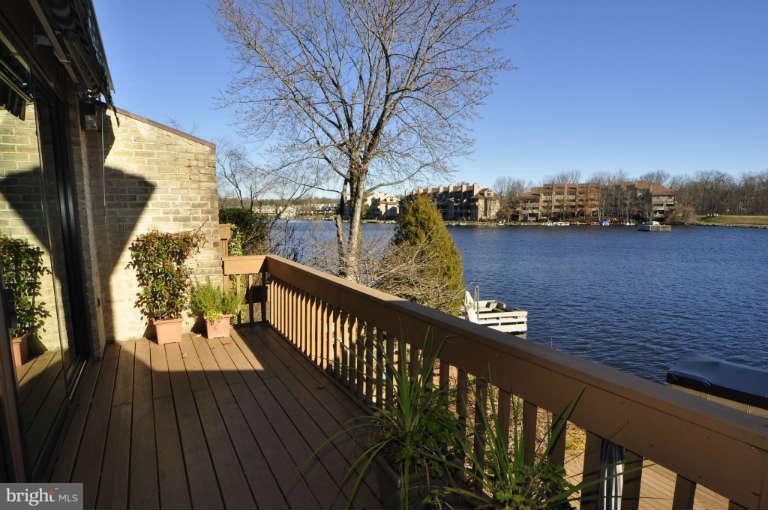 2011 Lakewinds Drive Reston, VA 20191 - Photo 11 of 26 Two Pella sliding doors lead to the main deck.