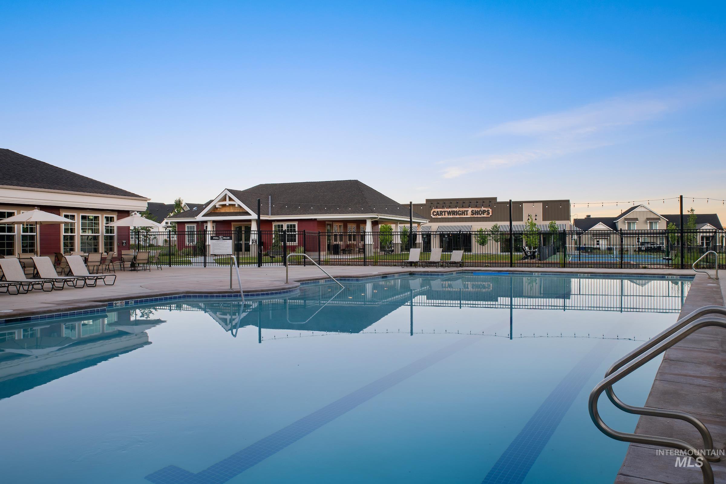 11685 North Rabbitbrush Way Boise, ID 83714 - Photo 8 of 35 Community pool with a patio