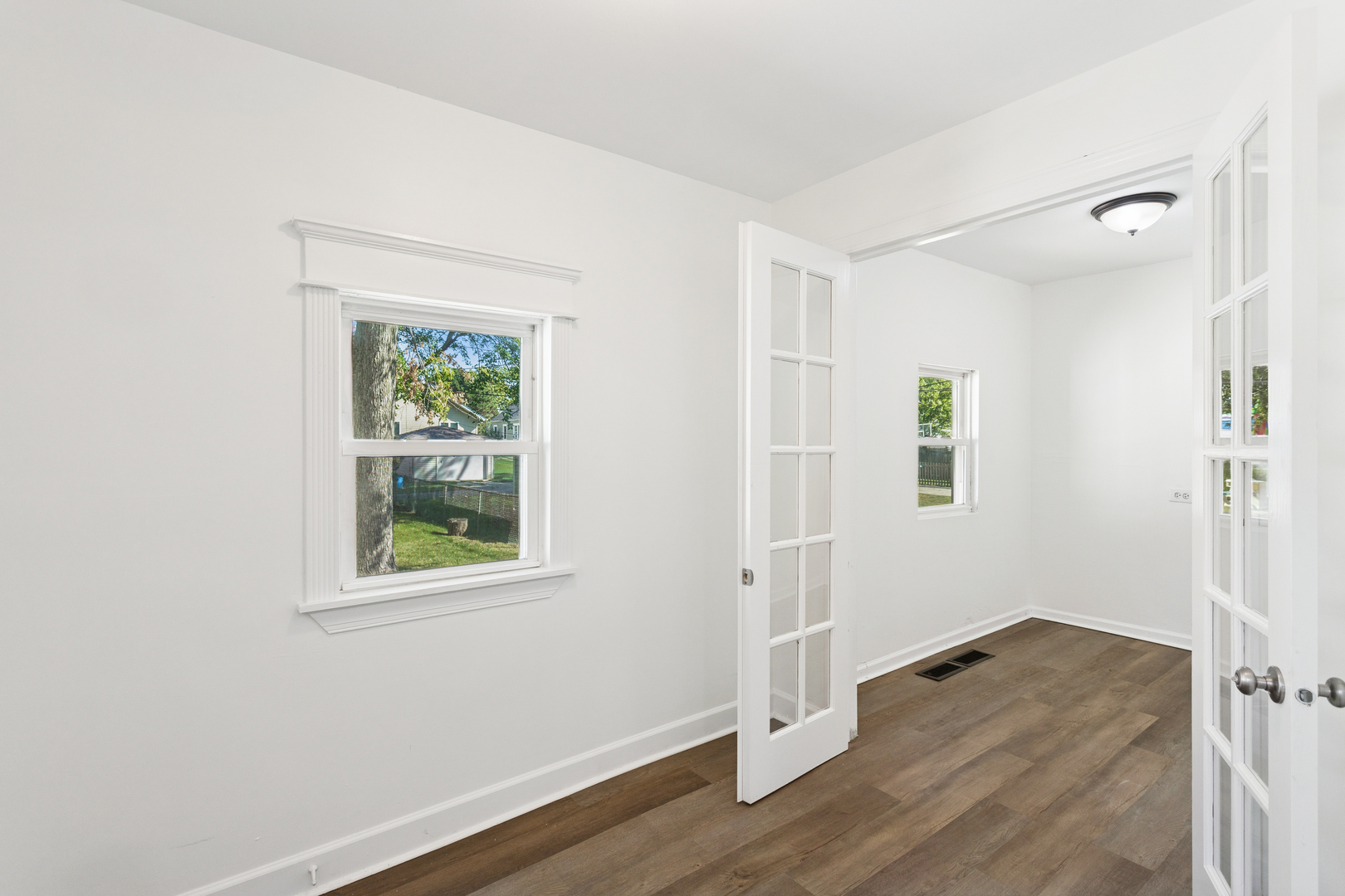540 East 4th Street Lockport, IL 60441 - Photo 15 of 24 a view of a room with wooden floor and window