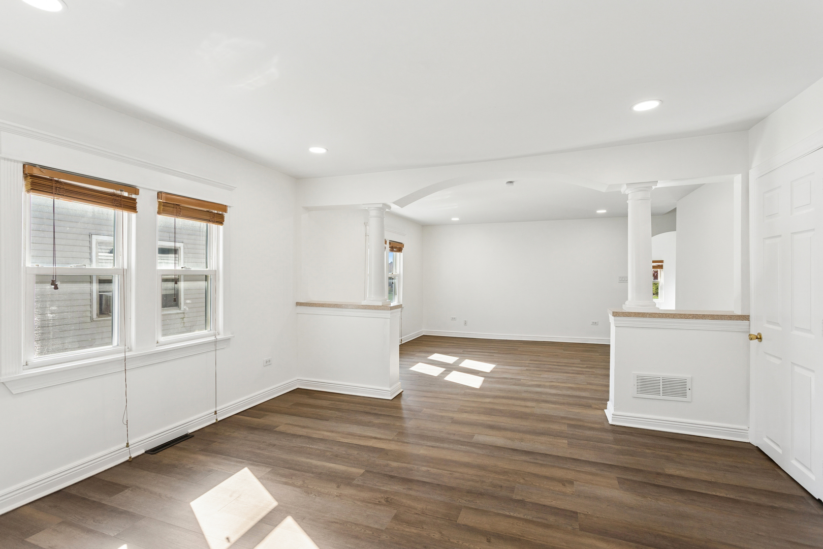 540 East 4th Street Lockport, IL 60441 - Photo 6 of 24 a view of empty room with wooden floor and fan