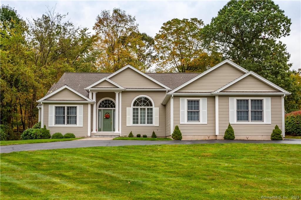 389 Wedgewood Road Southington, CT 06489 - Photo 1 of 1 a front view of a house with a garden