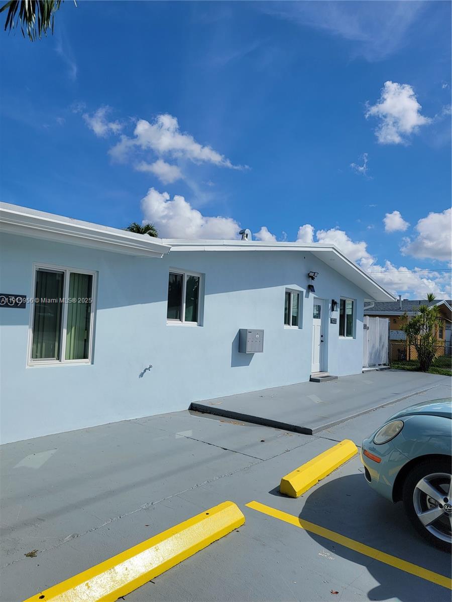1037 West 23rd Street Hialeah, FL 33010 - Photo 32 of 41 a view of a house with swimming pool