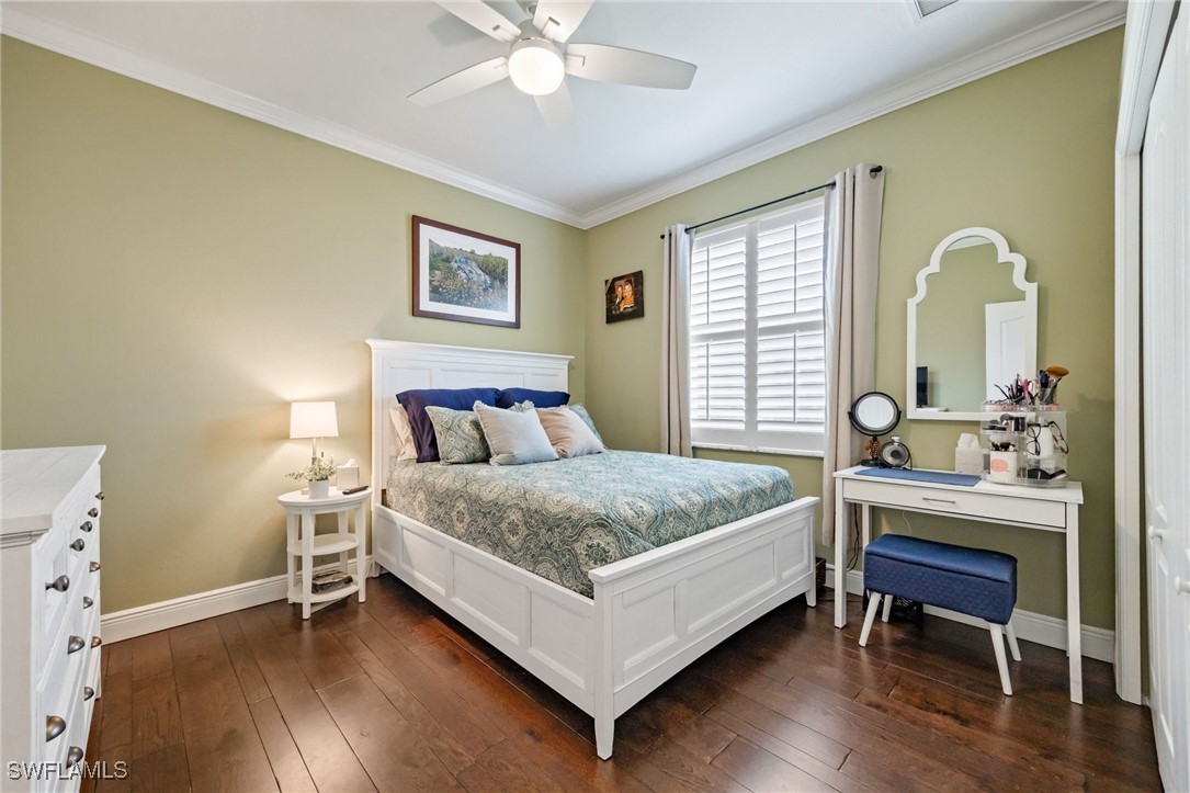 12977 Turtle Cove Trail North Fort Myers, FL 33903 - Photo 20 of 45 a bedroom with a bed and a table