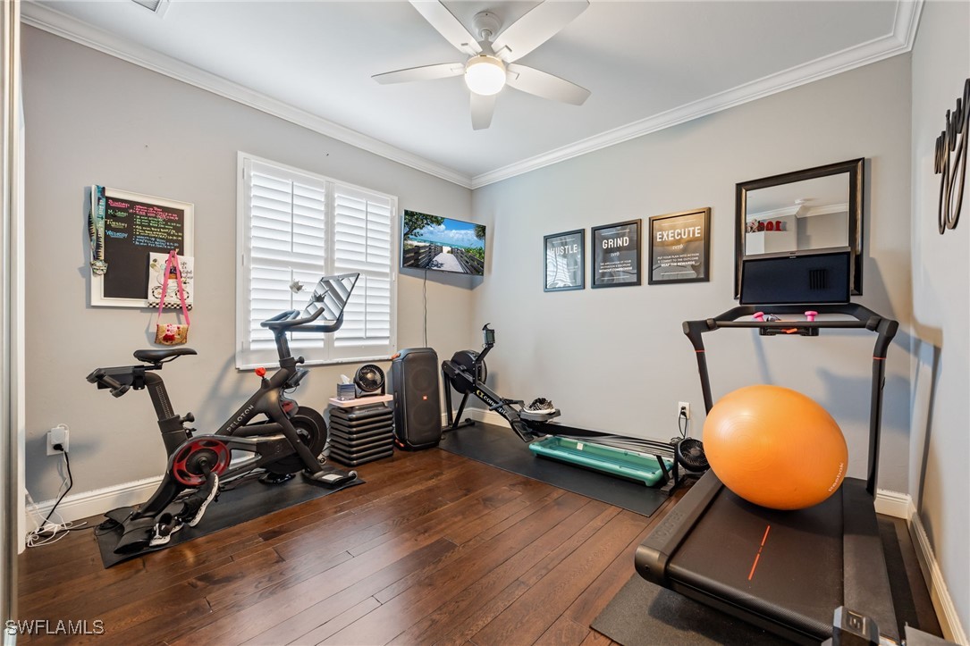12977 Turtle Cove Trail North Fort Myers, FL 33903 - Photo 22 of 45 a room with wooden floor and gym equipment