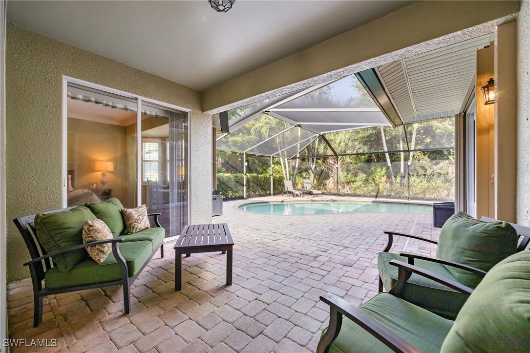 12977 Turtle Cove Trail North Fort Myers, FL 33903 - Photo 29 of 45 a living room with furniture and a large window