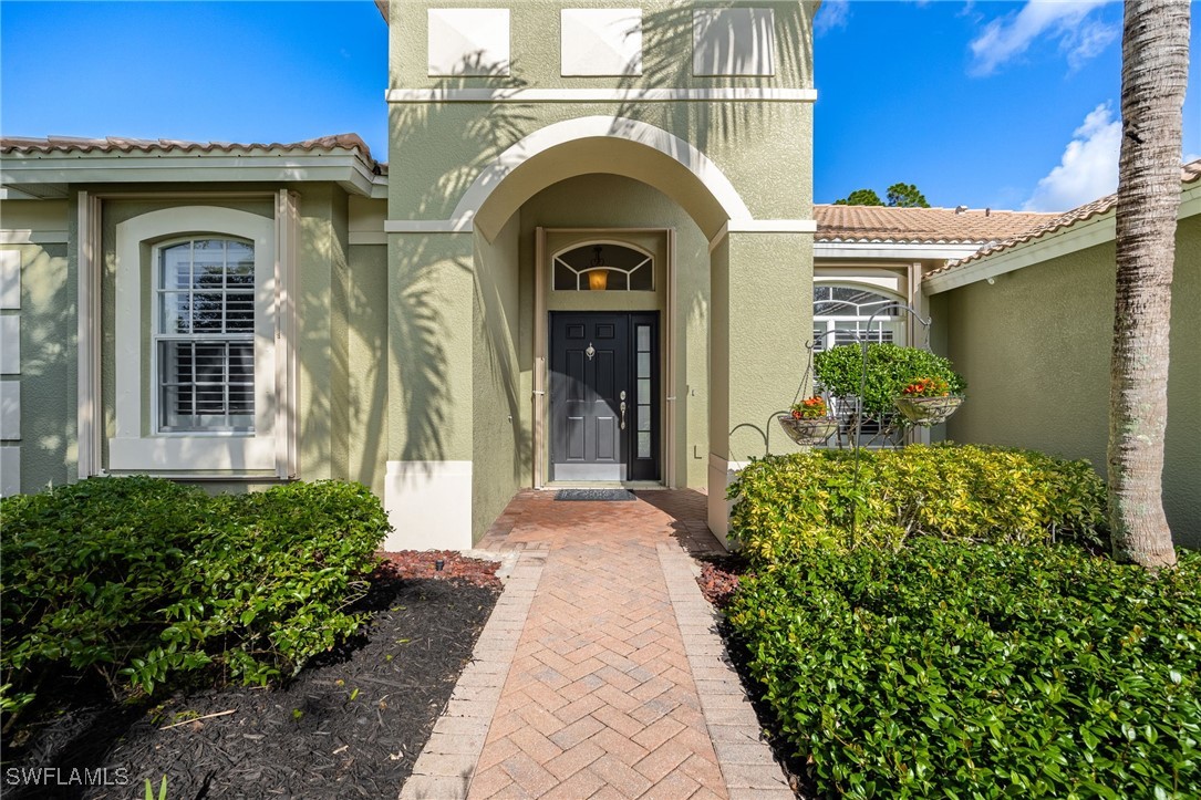 12977 Turtle Cove Trail North Fort Myers, FL 33903 - Photo 3 of 45 a view of a house with potted plants