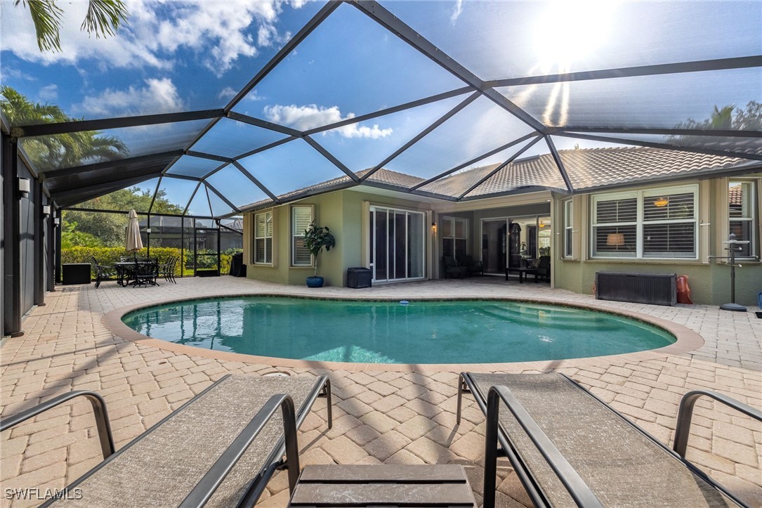 12977 Turtle Cove Trail North Fort Myers, FL 33903 - Photo 33 of 45 a view of a house with backyard and sitting area