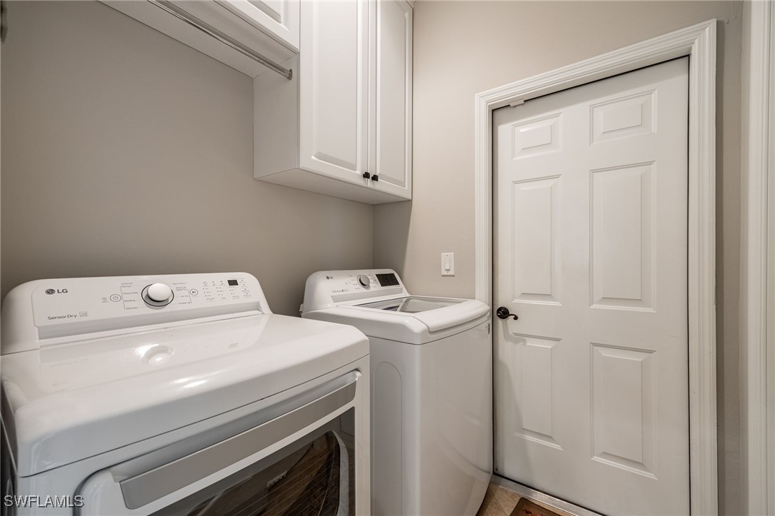 12977 Turtle Cove Trail North Fort Myers, FL 33903 - Photo 35 of 45 a utility room with dryer and washer