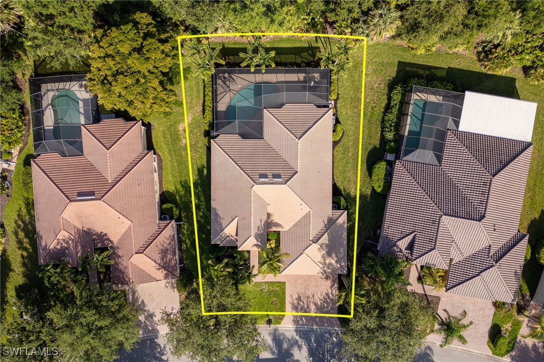 12977 Turtle Cove Trail North Fort Myers, FL 33903 - Photo 38 of 45 an aerial view of a house with a yard