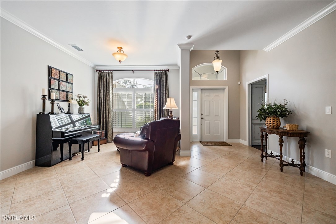 12977 Turtle Cove Trail North Fort Myers, FL 33903 - Photo 7 of 45 a living room with furniture and a window