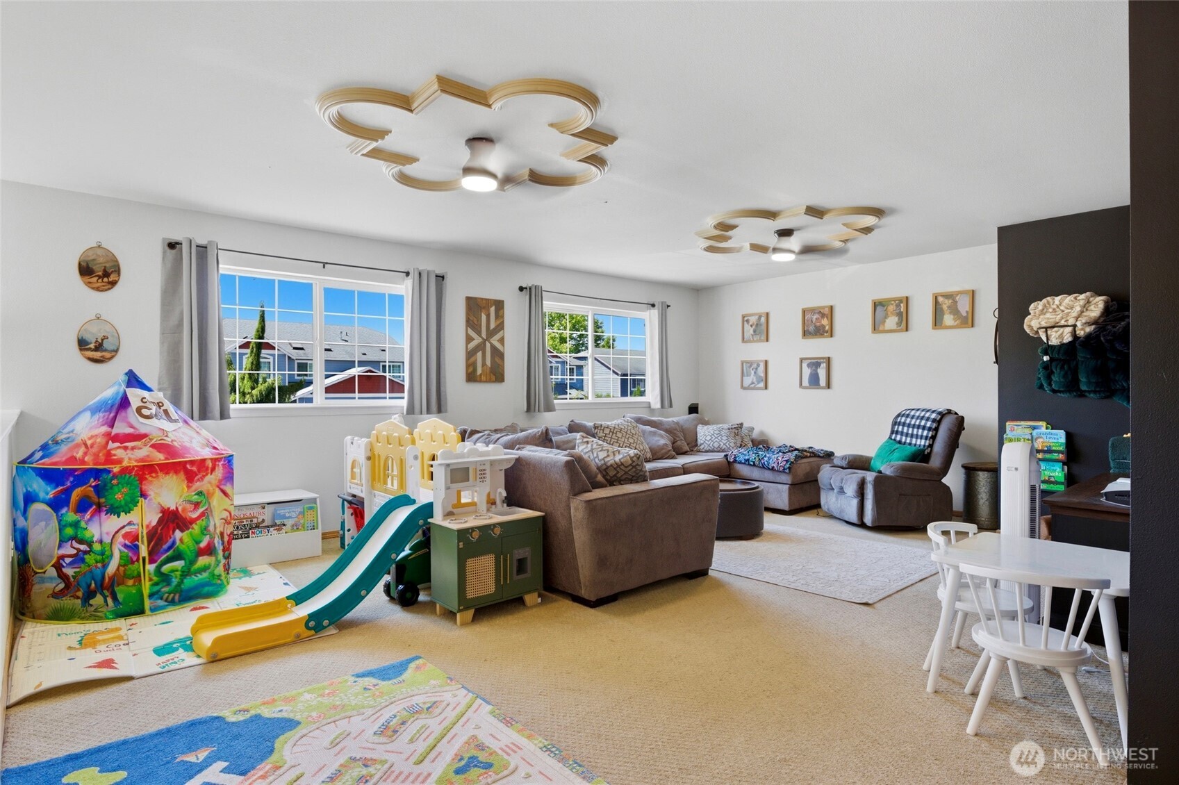 14005 Cedar Court Sultan, WA 98294 - Photo 13 of 38 a living room with furniture toys and a large window
