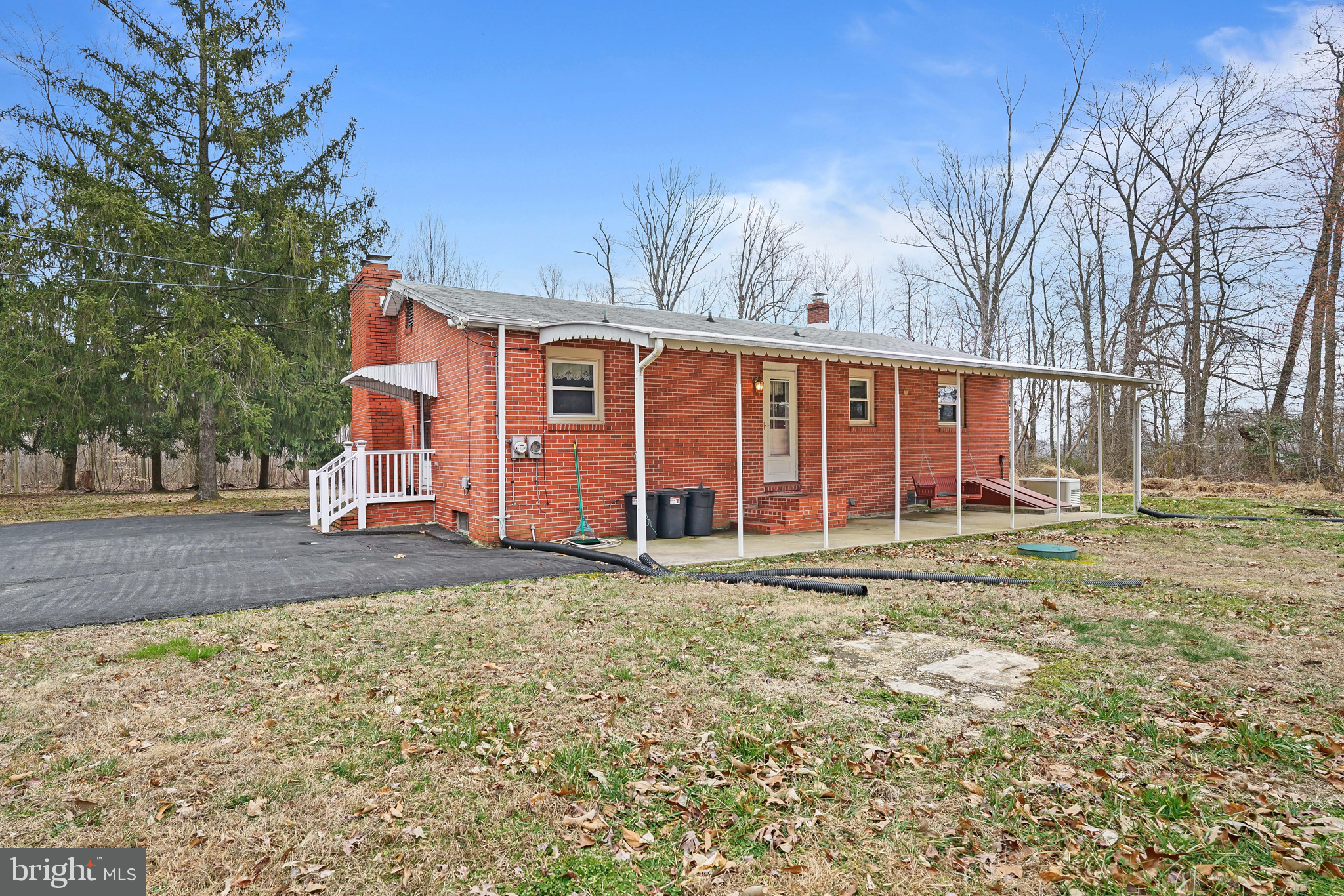 249 Washington Schoolhouse Road Rising Sun, MD 21911 - Photo 8 of 24 a view of a house with a yard and garage
