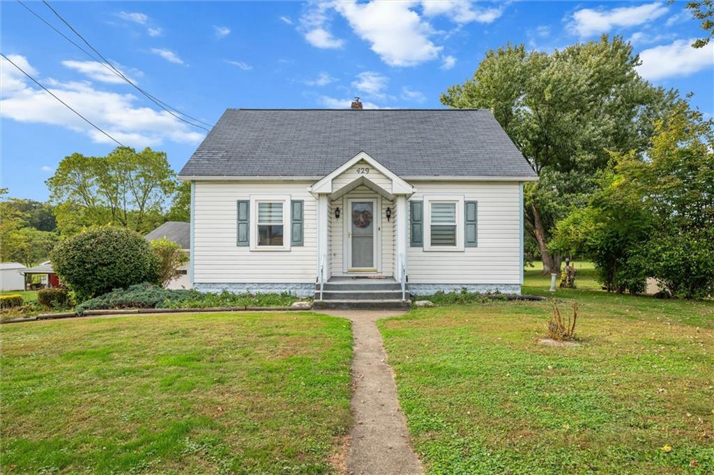 a view of a house with a swimming pool