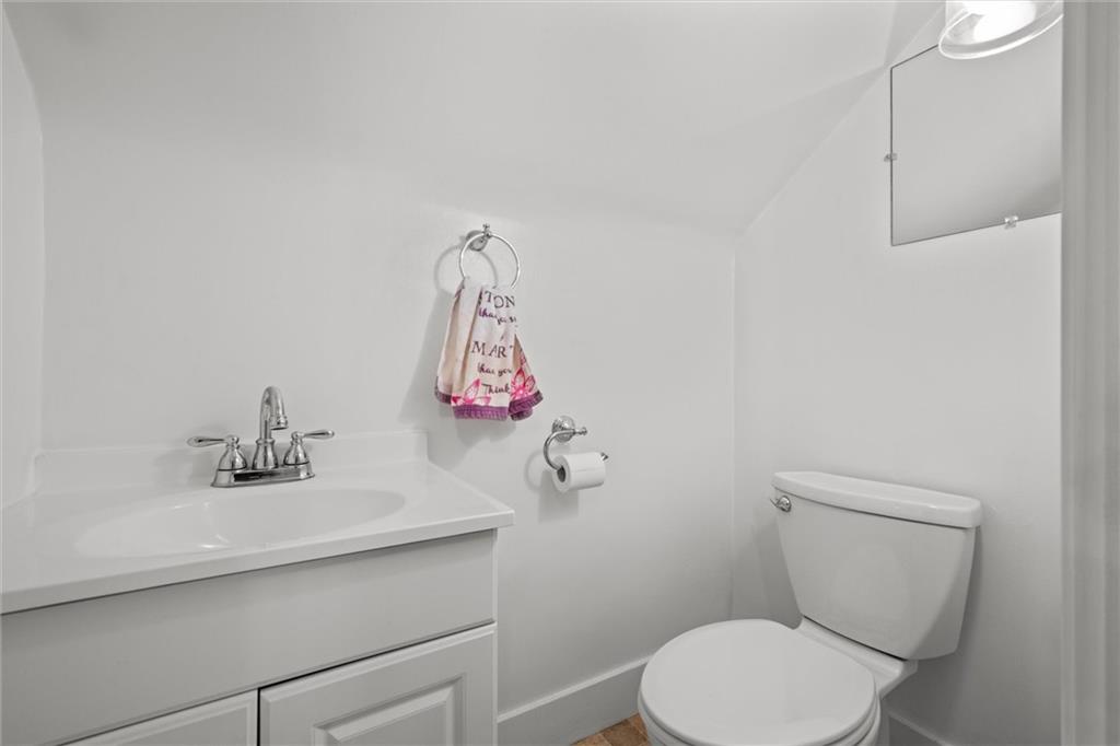 429 Marwood Road Cabot, PA 16023 - Photo 15 of 35 a bathroom with a sink mirror vanity and toilet