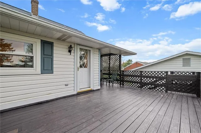a view of a house with a roof deck