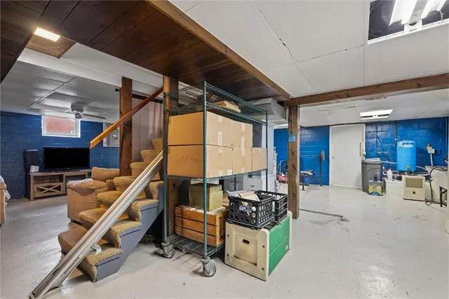 a view of a livingroom with walk in closet and bedroom