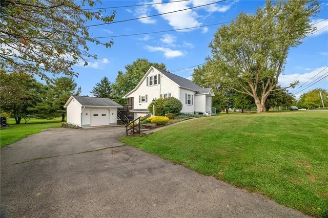 a house view with a garden space