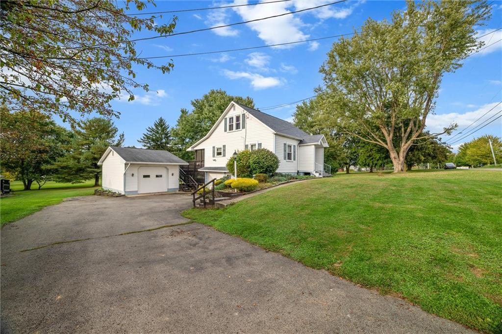 429 Marwood Road Cabot, PA 16023 - Photo 26 of 35 a front view of a house with garden