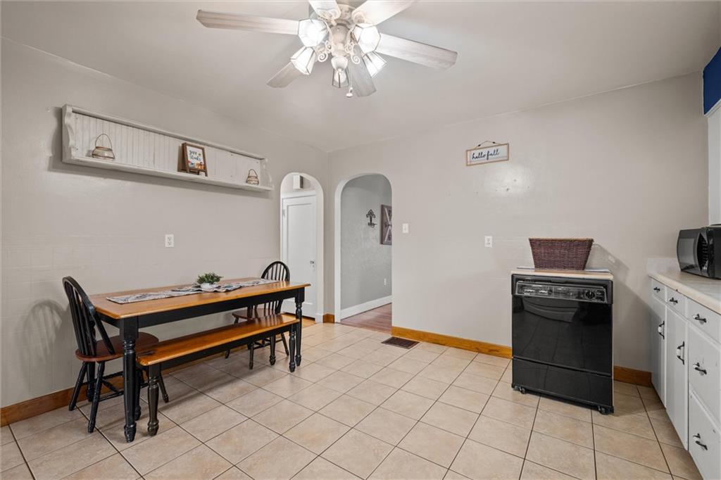 429 Marwood Road Cabot, PA 16023 - Photo 6 of 35 a living room with a piano and a stove top oven