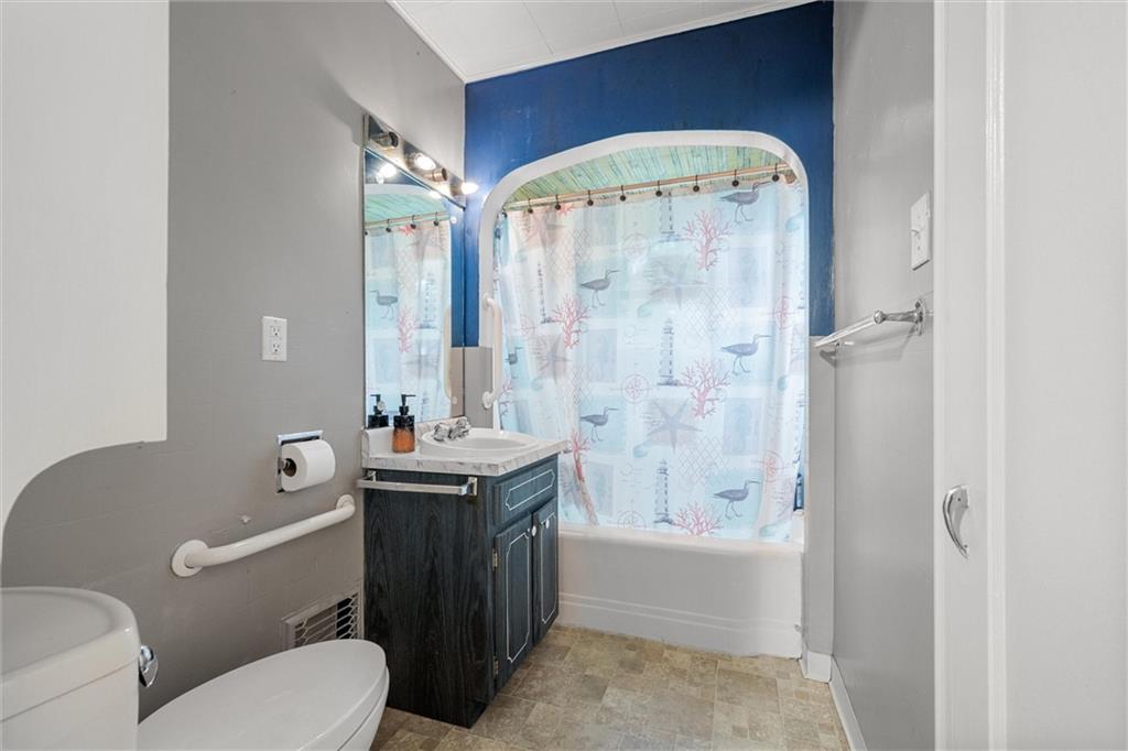 429 Marwood Road Cabot, PA 16023 - Photo 9 of 35 a bathroom with a granite countertop toilet a sink and bathtub