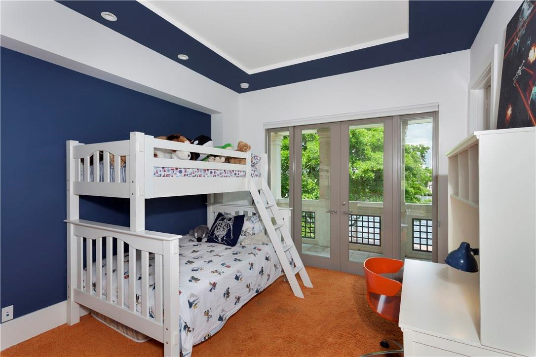 23 Saranac Road Sea Ranch Lakes, FL 33308 - Photo 23 of 29 a bed room with furniture and windows