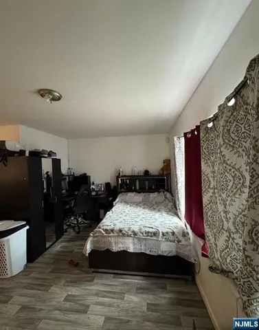 a bathroom with a bathtub and a toilet