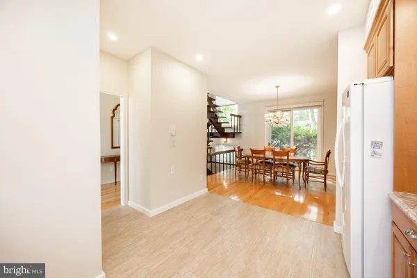 a view of dining room with furniture and floor to ceiling window