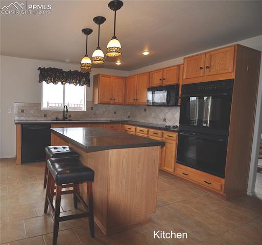 8531 Del Rio Road Peyton, CO 80831 - Photo 7 of 30