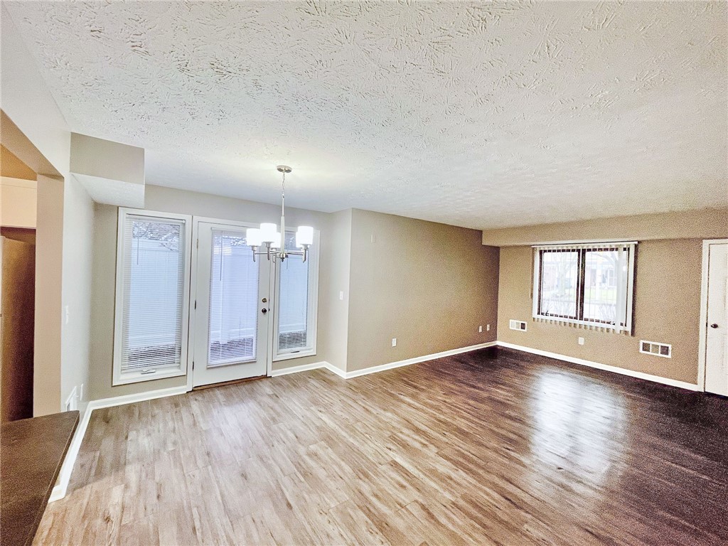 296 South Fitzhugh Street Rochester, NY 14608 - Photo 2 of 9 Typical Great Room view showing dining & living ro