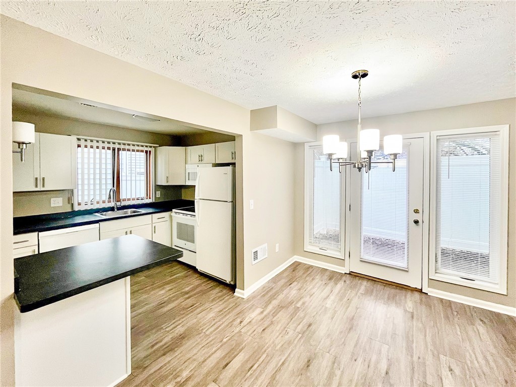 296 South Fitzhugh Street Rochester, NY 14608 - Photo 4 of 9 Typical kitchen with all new cabinets, counters, &