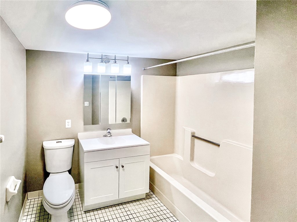 296 South Fitzhugh Street Rochester, NY 14608 - Photo 8 of 9 Typical full bathroom with tub/shower combo