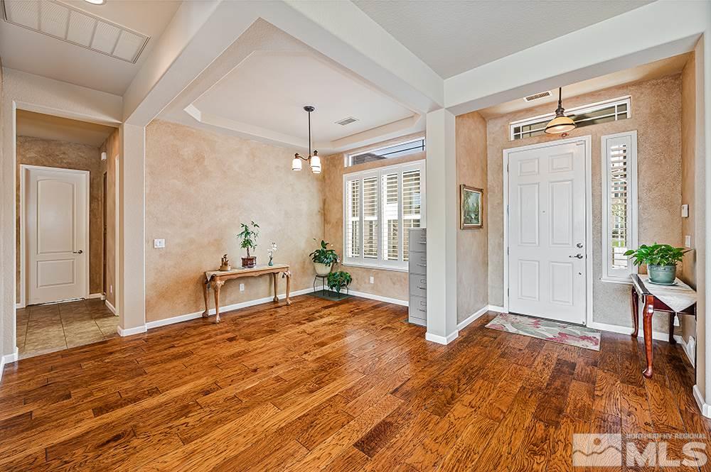 2905 Bull Rider Drive Reno, NV 89521 - Photo 12 of 33 a view of a livingroom with wooden floor and furniture