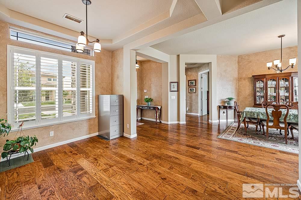 2905 Bull Rider Drive Reno, NV 89521 - Photo 13 of 33 a view of a livingroom with furniture window and wooden floor