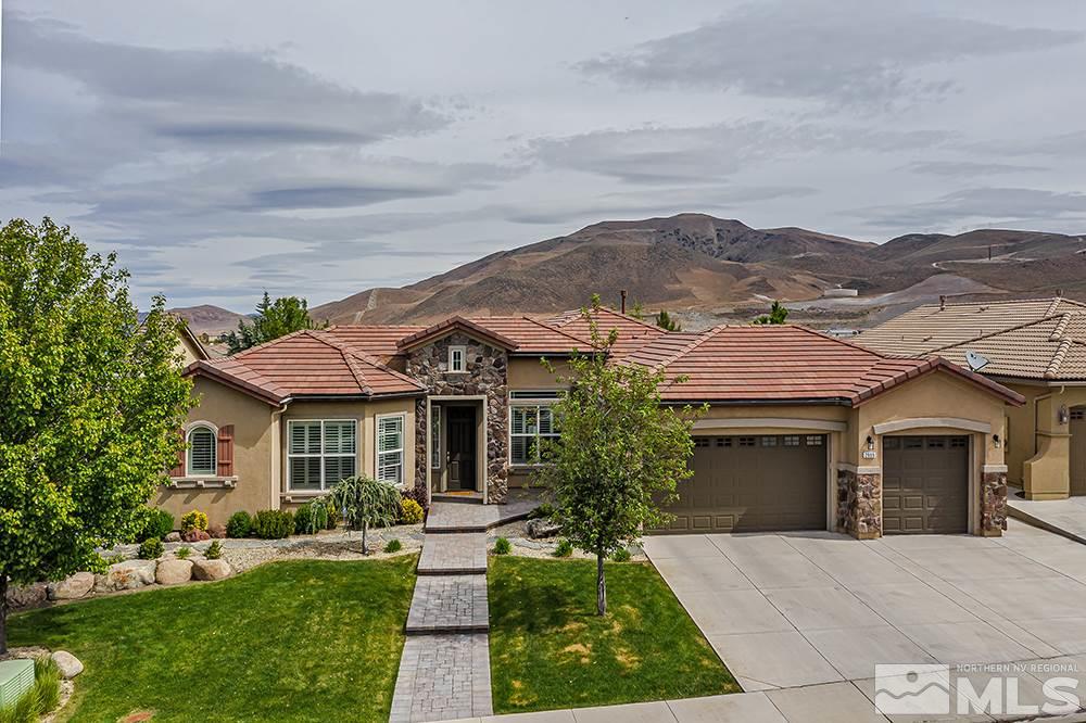 2905 Bull Rider Drive Reno, NV 89521 - Photo 2 of 33 a front view of a house with a yard