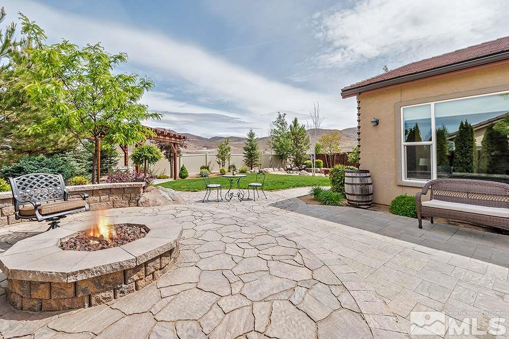 2905 Bull Rider Drive Reno, NV 89521 - Photo 28 of 33 a view of a house with backyard and sitting area