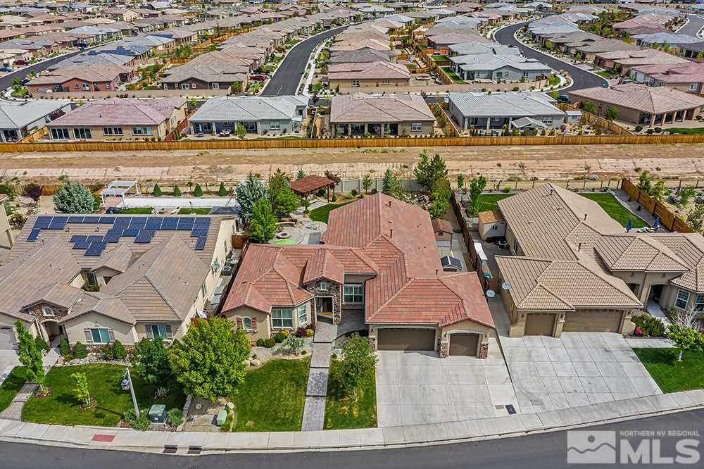 2905 Bull Rider Drive Reno, NV 89521 - Photo 4 of 33 an aerial view of multiple houses with yard