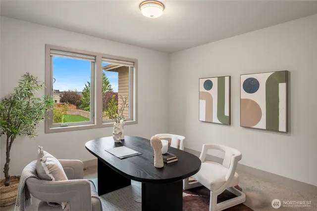 a view of a dining room with furniture window and outside view