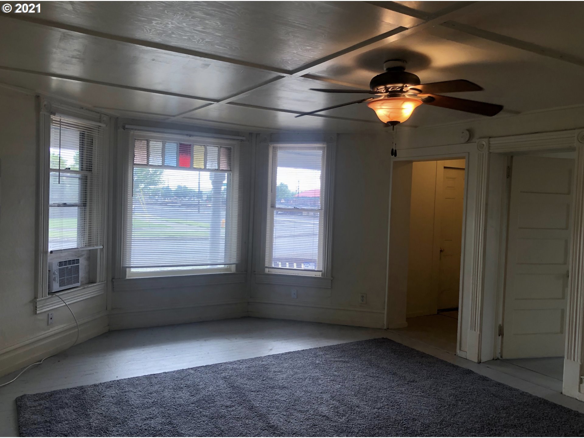 602 South Main Street Pendleton, OR 97801 - Photo 3 of 26 a view of an empty room with a window