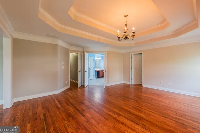 a view of livingroom with hardwood floor and ceiling fan