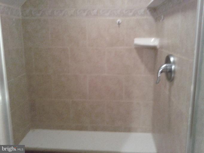 3611 Adams Drive Silver Spring, MD 20902 - Photo 11 of 16 a bathroom with a shower
