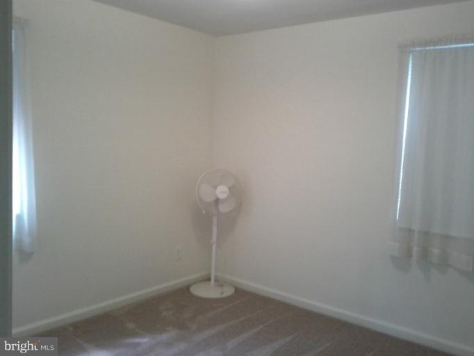 3611 Adams Drive Silver Spring, MD 20902 - Photo 5 of 16 a empty room with a shower