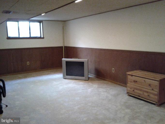 3611 Adams Drive Silver Spring, MD 20902 - Photo 7 of 16 an empty room with windows