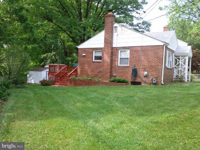 3611 Adams Drive Silver Spring, MD 20902 - Photo 9 of 16 a backyard of a house with lots of green space