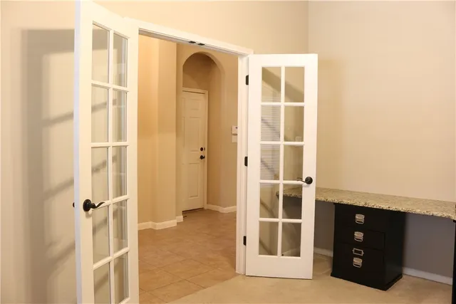 a view of a bathroom with a glass door