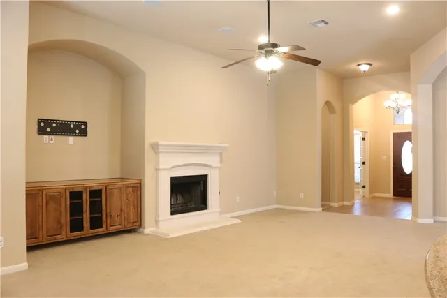 a view of a livingroom with a fireplace