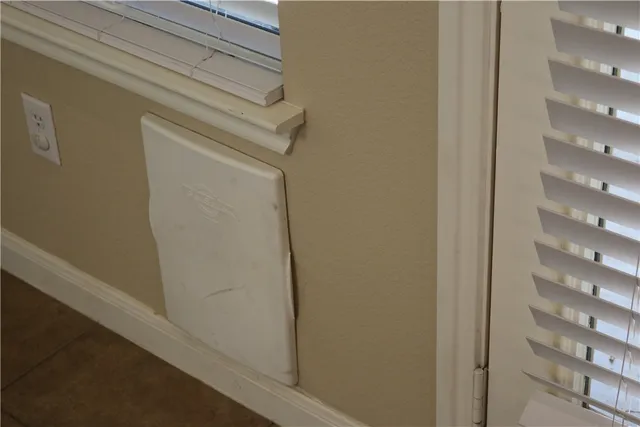 a view of a living room and a window