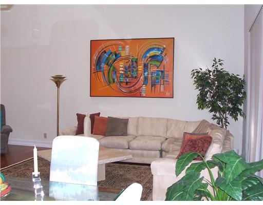 7727 La Mirada Drive, Unit 118 Boca Raton, FL 33433 - Photo 3 of 16 a living room with furniture and a potted plant