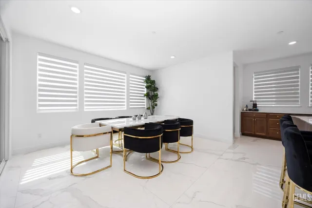 a table and a chair in a room