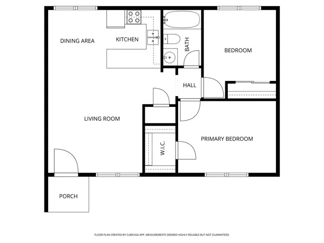 a view of a livingroom with a hardwood floor and a ceiling fan