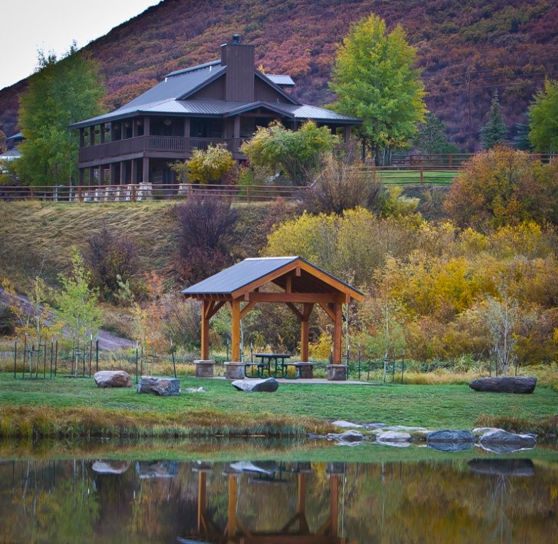 25060 Rainbow Ridge Oak Creek, CO 80467 - Photo 16 of 30 a view of a house with a yard
